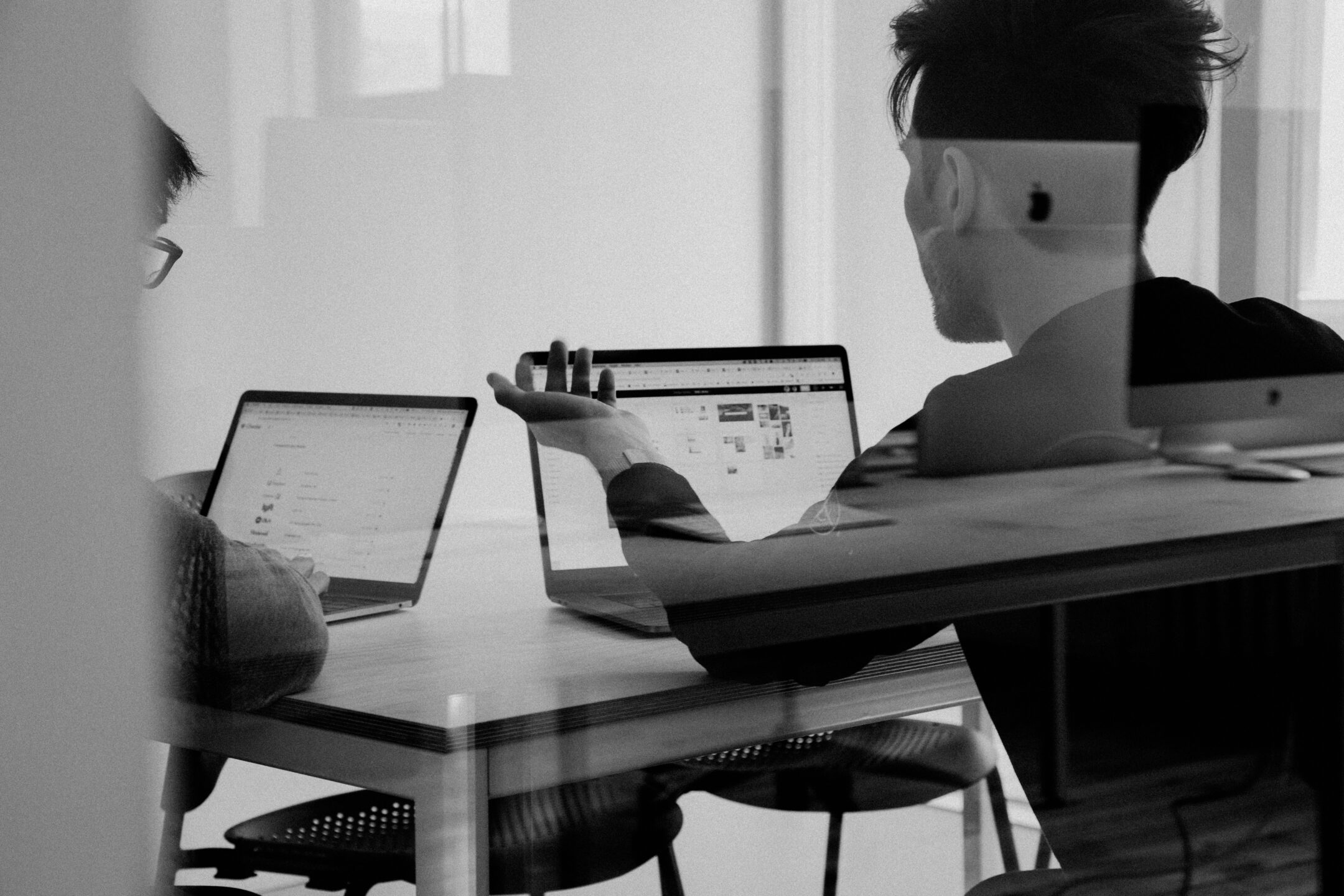 picture of people working at a laptop